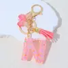Llavero Rosa Pegamento Nieve Lentejuela Letra con Borla de Mariposa Colgante para Bolsa de Niñas Regalo de Fiesta