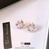 Resplandor Floral Aretes y collar de flor de circonita cúbica estilo francés, una cadena ligera y minimalista para la clavícula, perfectos para el uso diario y un estilo versátil