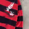Al por mayor transfronterizo europeo y americano Camiseta de manga larga de otoño Patrón de bloques de color a rayas rojas y negras Estilo callejero Patrón estampado Top para hombre