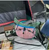 Bolso de nailon súper popular de nicho para mujer, nuevo modelo 2026, bolso cruzado ligero y versátil, moderno bolso tipo albóndiga para hombro y debajo del brazo