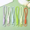 Correa para teléfono móvil de flor hueca transparente para macarrón, cordón tejido para muñeca anti-pérdida, accesorio pequeño universal para llaves, estilo femenino