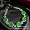 Suministro de transmisión en vivo pulsera de calcedonia blanco hielo pulsera de mujer huevo de paloma superficie de anillo grande moda moderna retro