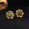 Pendientes dorados con flores talladas europeas y americanas transfronterizas, núcleo de flor turquesa