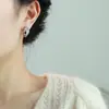 Nuevos Pendientes de Clip Metálico de Zirconia para Oreja con Bobina de Mosquito Pendientes Únicos de Estilo Europeo y Americano Simples Elegantes de Gama Alta