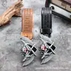 Tendencia de personalidad esqueleto y espada aleación hebilla grande de placa cinturón hombres estilo western Denim juvenil PU cinturón una generación de pelo