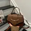 Bolsa de Mão Feminina com Textura Trançada Retro Francesa 2026 Nova Bolsa Transversal de Luxo para o Trabalho Bolsa Selim de Nicho