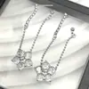 Pendientes Colgantes con Borla de Cuentas Redondas Flor de Diamante Blanco para Mujer Lujo Ligero Diseño de Nicho Alta Moda Nuevo Estilo Personalidad Versátil de Moda