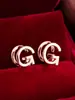 Pendientes de botón casuales de moda populares, creativos, con diseño de letra, simples, versátiles para el día a día, de alta calidad, lujo ligero