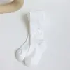 Meia-calça infantil bebê primavera e outono meia de camada base infantil meias de peça única com laço produtos transfronteiriços calça de camada base para menina atacado