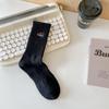 Calcetines de algodón para hombre y mujer, con dibujos animados en blanco y negro, de longitud media, bordados para parejas, para estudiantes, para combinar con todo, de caña alta, deportivos, de moda.