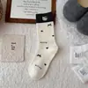Meias Outono e Inverno Meias Femininas Pretas Meias Longas Gato Cartoon Fofo Jacquard Meias de Cano Médio Versáteis Meias Largas Venda por Atacado