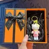 Chaveiro Criativo de Gatinho KT Chefe Flocado Desenho Animado Pingente de Bolsa Fofo Chaveiro de Carro Presente Atacado
