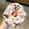 2026 Novos Scrunchies de Bolinhas Elásticos Altos Prendedores de Cabelo para Mulheres Doces de Alto Valor Corda de Cabelo com Laço Acessórios de Cabelo