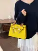 Bolso de mujer de nicho de alta gama 2026 nuevo de primavera vintage versátil bandolera bolso de mano versátil casual bolso tipo Kelly