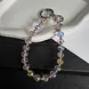 Colgante redondo de cristal facetado plateado de alta gama, estilo nuevo de lujo ligero, correa para teléfono, llavero, accesorio para bolso