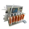 Máquina Rellenadora Automática de Bolsas Stand-up Luosifen Sopa Leche Leche de Soya Jugo Medio Boquilla de Succión Máquina Rellenadora Cuantitativa de Bolsas
