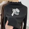 Camiseta Térmica Escovada de Manga Longa com Babados e Gola Meio Alta, Novo Estilo Outono/Inverno 2026 para Bebês Meninas
