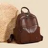 Mochila feminina transfronteiriça nova de couro PU macio, moderna e minimalista, adequada para o trabalho, uso casual e viagens; uma bolsa pequena versátil para mulheres