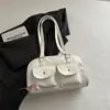 Bolsa de Bowling Retrô Primavera e Verão para Mulheres 2026 Nova Elegante Bolsa de Ombro Único para Sobrancelha Bolsa de Mão de Nicho Francês Bolsa Baguette