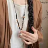 Colar Aromático Zen Flor de Bodhi Estilo Chinês Novo para Mulheres 2025 Novo Estilo Étnico Acessório de Corrente Longa de Madeira para Suéter