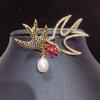 Boutique cobre micro-incrustado perla natural de agua dulce golondrina pin corsage broche de perlas artesanía de alta gama suministro transfronterizo