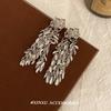 Pendientes vintage con borlas de rosa dorada 2024, nuevos pendientes versátiles de moda elegantes de estilo frío para otoño e invierno.