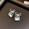 Pendientes de plata súper etéreos y exquisitos con lazos incrustados de diamantes para mujer, pendientes de nicho de lujo ligero de alta gama con un encanto único y elegante