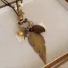 Colar com Pingente de Couro Boêmio Nicho Temperamento Retrô Corrente para Clavícula Versátil Moda Joias de Alto Padrão Atacado