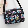 Bolsa de pano de flores Nova bolsa crossbody feminina Pano Oxford Bolsa de mãe de meia-idade e idosa Bolsa Bolsa de ombro multicamadas Bolsa de lona