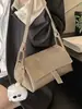 Bolsa Pequena Texturizada Retrô Transfronteiriça para Mulheres 2026 Novo Estilo Simples e Elegante Bolsa Almofada Bolsa de Ombro Transversal Retrô de Nicho