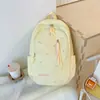 Mochila nueva de estilo japonés ins de alta apariencia, fresca y dulce, color caramelo con lazo, para estudiantes de secundaria y preparatoria, bolsa ligera de doble hombro