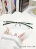 Nuevo modelo de montura de gafas de aleación TR ultraligera con borde cortado, montura de gafas elegante para miopía y presbicia, montura de gafas para hombre E50