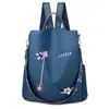 Mochila Antirrobo para Mujer 2025 Nuevo Estilo Coreano Mochila de Nailon Casual Florales para Exteriores Ligera de Doble Propósito Mochila de Moda