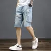 Pantalones de cinco puntos de verano de moda ajustados ajustados lavados para jóvenes populares nuevos pantalones vaqueros de cintura media para hombres no elásticos que combinan con todo de moda