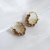 Pendientes de lujo ligeros con forma de U de color champán, estilo retro, con hebilla de oreja, diseño de nicho, de temperamento moderno, nueva joyería para mujer