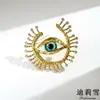 Broche Ojo Azul Pavo de Nieve Dili Ojo del Diablo Corsage Cruzado Reto Europeo y Americano Pin