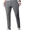 Comércio exterior fábrica original verão ultra-fino secagem rápida casual calça comprida masculina elástica calça esportiva calça de seda gelada slim fit