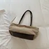 Bolso tote minimalista de nicho estilo coreano 2026 nuevo modelo bolsa de gran capacidad para debajo del brazo bolso de hombro de color liso retro de nicho para commuting
