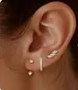 Conjunto de tres pendientes de lujo con diseño de mariposa y estrella de circonitas, chapados en latón dorado auténtico, estilo europeo y americano.