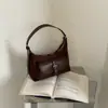 Bolsa de Ombro/Transversal Feminina Pequena de Pelúcia Camurçada com Ponto Cruz 2026 Outono/Inverno Nova Elegante Versátil para o Dia a Dia