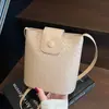 Bolsa de Palha Tecida de Luxo para Mulheres 2026 Novo Estilo Coreano Moda Versátil Bolsa de Ombro Bolsa Transversal de Nicho