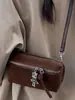 Bolsa Pequena com Textura Retrô Bolsa Feminina 2025 Outono Nova Couro de Alto Valor Bolsa Pequena Quadrada Bolsa Transversal Simples
