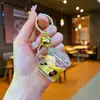 Nuevo llavero de bubble tea oso de leche pequeño flotante botella de arena movediza líquida adorno colgante de regalo para pareja bolsa de regalo adornos colgantes para mujer