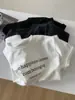 Bromu Corte Holgado Estampado de Letras Manga Corta Cepillada para Mujer Primavera 2026 Versátil Cuello Redondo Suéter Camiseta Casual