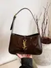 Nova Bolsa de Ombro da Moda 2026 com Toque de Luxo, Bolsa Versátil Feminina de Estreia Transfronteiriça, Bolsa Baguete Lisa Estilo Americano