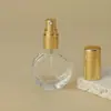 Botella de perfume de vidrio de 10 ml, botella rociadora redonda plana, botella recargable de perfume, botella de muestra de perfume, botella cosmética con tapa de rosca