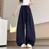 Pantalones de pierna ancha finos de moda versátiles para principios de otoño con cordón cintura elástica pantalones simples de cintura alta adelgazantes pantalones curvos pantalones casuales para mujer