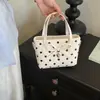Bolso de mano con lazo y lunares estilo dulce y femenino para mujer, bolso de hombro y cruzado de lujo ligero para verano 2026 para salir y citas