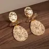 Pendientes Retro Europeos y Americanos de Personalidad con Pliegues Irregulares Geométricos Ovalados Pendientes de Diseño Sencillo de Nicho Transfronterizo con Textura Martillada