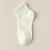Calcetines de una pieza con costuras de color sólido sin varillas para hombres y mujeres, transpirables y absorbentes del sudor, calcetines de tubo medio, calcetines de algodón universales de cuatro estaciones de varios estilos.